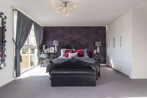 Master Bedroom- click for photo gallery